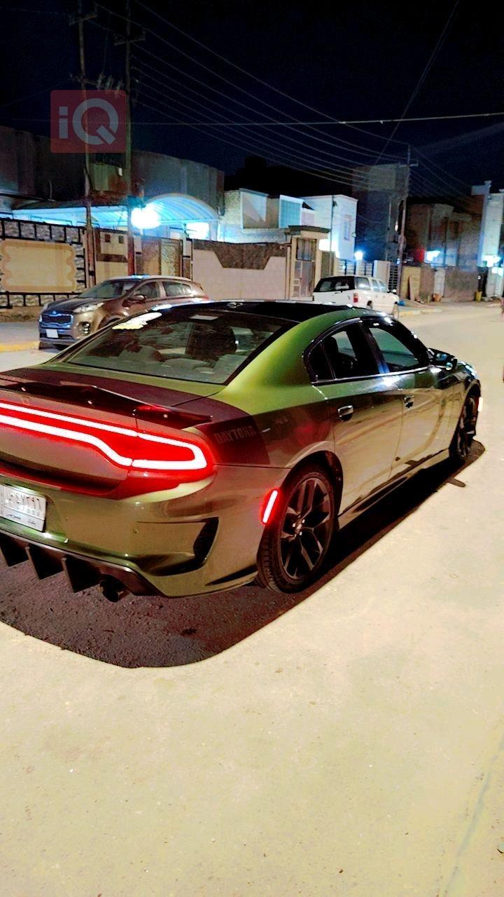 دۆج چارجەر